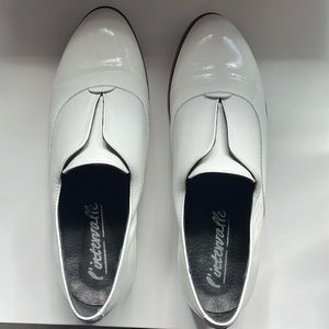 Patented white leather shoes
